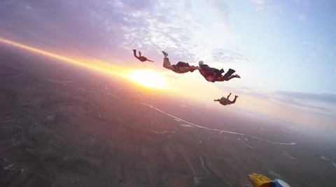 Extreme skydiving with parachute in the morning light Stock Footage