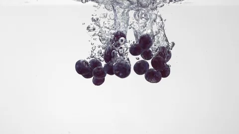 Extreme Slow Mo Of Fresh Grapes Falling Into Water Stock Footage 125991116