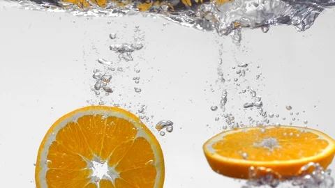 Extreme Slow Mo Of Fresh Orange Slices In Water Stock Footage 125990847