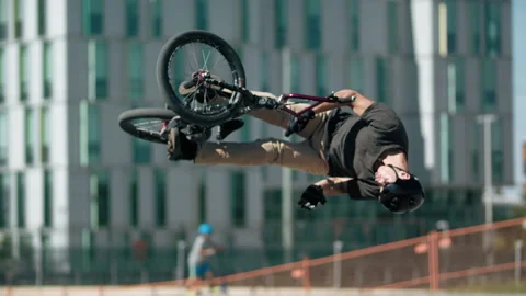 Extreme slow motion backflip bar spin bmx trick Stock Footage 171256156