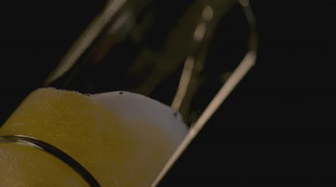 Extreme slow motion of beer being poured in the glass Video stock 58333388