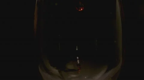 Extreme slow motion of wine being poured in the glass Stock Footage 58333889