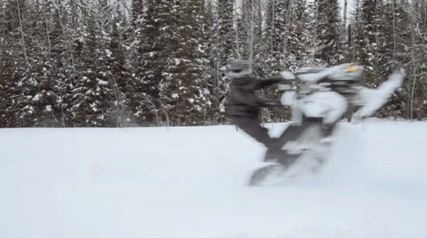 Extreme Snowmobiler does a wheelie Stock Footage 33190261
