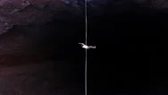Extreme Sport Of Slacklining, Top View On A Man Walking The Tightrope, 4K Stock Footage