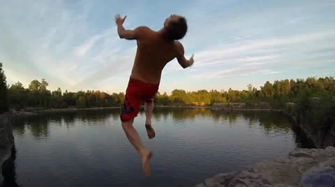 Extreme Sports - Cliff Jumping Flips - 2 angles Stock Footage