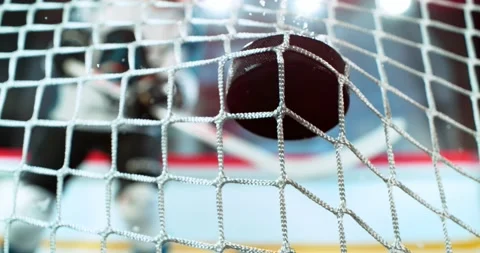 Extreme super slow motion close-up of a hockey puck Stock Footage 330424407