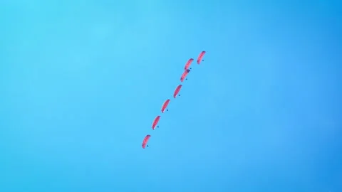 Extreme tricks with parachute at holidays. Video stock 249730873
