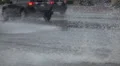 extreme weather slo mo tailgating compacts drive through flooded street HD 동영상
