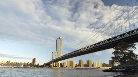 Extreme wide angle of Manhattan Bridge stretching under the early morning sky. Stock Footage 99095503