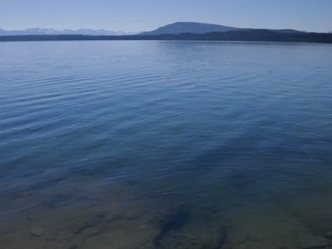 Extreme wide angle of mountain lake 4k 24fps Stock Footage 79294145