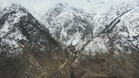 Extreme wide angle shot of waterfall and river in mountains. huge ice snow Video stock 157707805