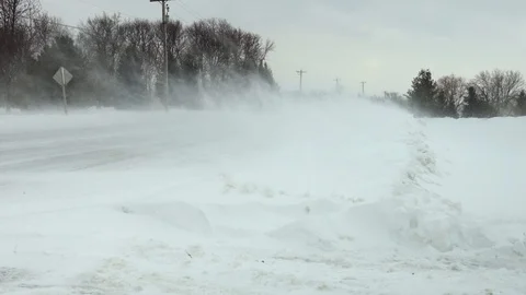Extreme wind, snow drifting in Winter snow storm blizzard Stock Footage 103863994