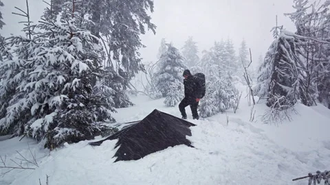 Extreme Winter Blizzard Storm On Mountain Peak Hiker Shelter Stock Footage 336497326