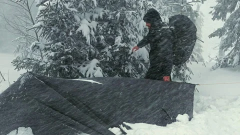 Extreme Winter Blizzard Storm On Mountain Peak Hiker Shelter Stock Footage 336497351