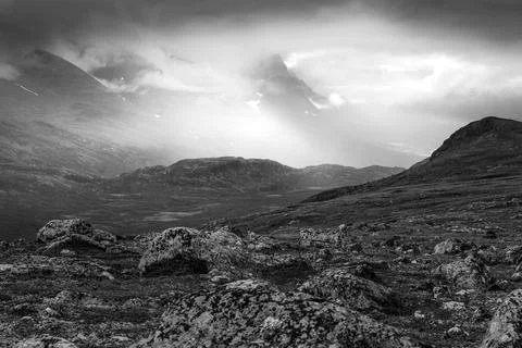 Extremely bad weather with low clouds and rain in remote, harsh arctic landscape Stock Photos