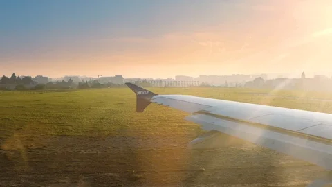 Extremely beautiful sun flare hitting on airplane preparing for take off Stock Footage 110762037
