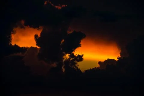 Extremely black sky with sunset. Typical African sky. Namibia. Africa. Stock Photos