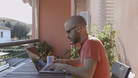 Extremely busy boy typing on his laptop. Caucasian guy working on computer Stock Footage 126594777