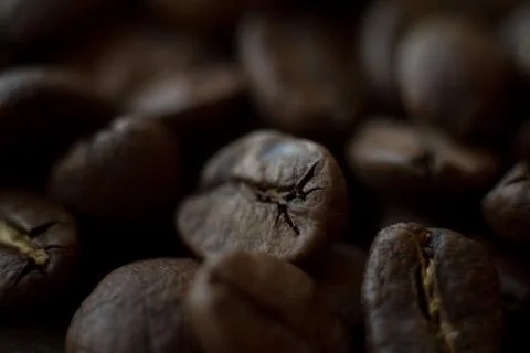 Extremely close-up background roasted coffee beans, good morning concept Stock Photos