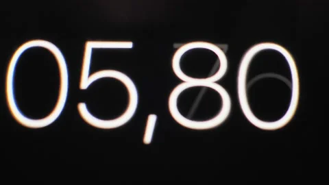Extremely close-up of the black screen of digital stopwatch with white running Stock Footage 155308164