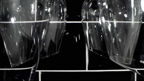 Extremely close-up detailed .Clean stylish wine glasses hanging upside down Stock Footage 194504008
