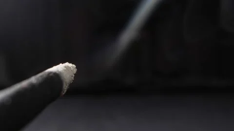 Extremely close-up detailed Incense, incense sticks smoldering with clouds of Stock Footage 195349088
