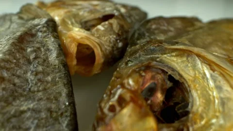 Extremely close-up, detailed. a lot of dried bream on the table Stock Footage 143345057