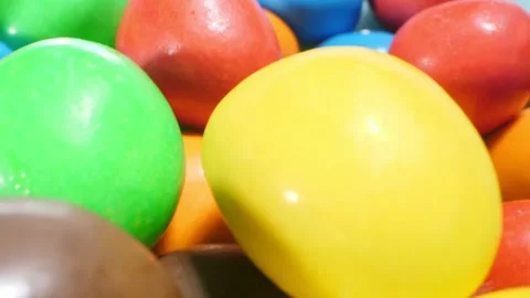Extremely close-up detailed plan. small colorful oval candies Stock Footage 195195176