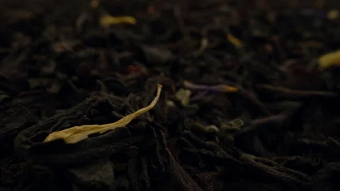 Extremely close-up dried black tea leaves background. Vídeos de archivo 147606796