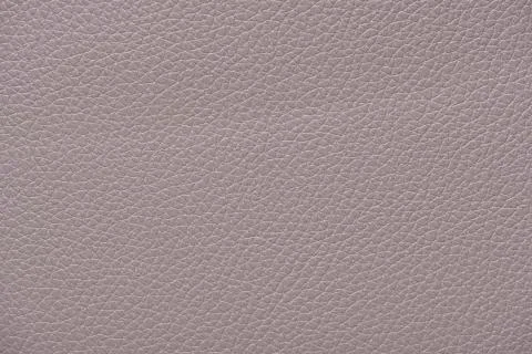 Extremely close-up light grey leather texture background surface Foto stock