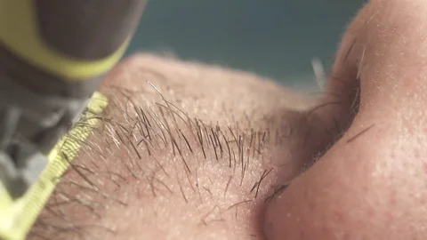 Extremely close-up, male beard with electric razor, skin irritation macro Video stock 98246728