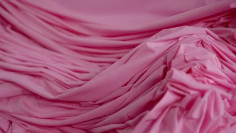 Extremely Close-up of the process of dyeing fabric pink. VietNam Garment Factory Stock Footage 247404923