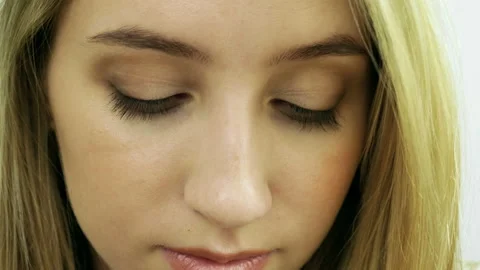 Extremely close-up shot of women's green eyes looking at camera. 4K Stock-Footage 102949872