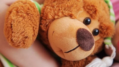 Extremely close up view of sleeping little girl, then she smiles happily and Stock Footage 99312052