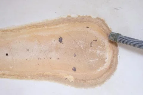 Extremely dirty bath surface covered with limescale or lime scale and rust Stock Photos
