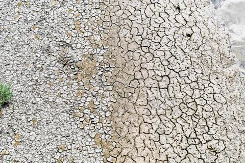 Extremely dry soil with torn open soil Stock Photos