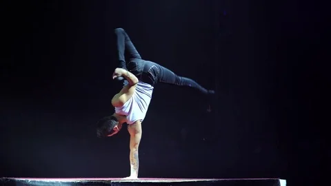 Extremely flexible man. Acrobatic trick. 4K. Stock Footage 84991860