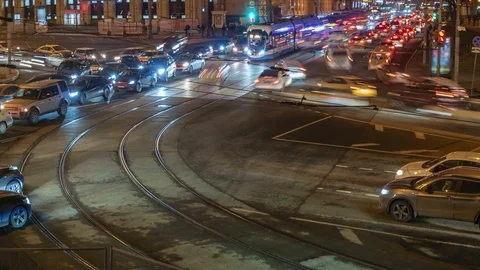 Extremely heavy traffic of trams and cars  on the crossroad , time lapse Stock Footage 125897313