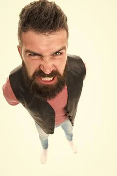 Extremely mad. Man aggressive face expression stand white background. Stressful Foto stock