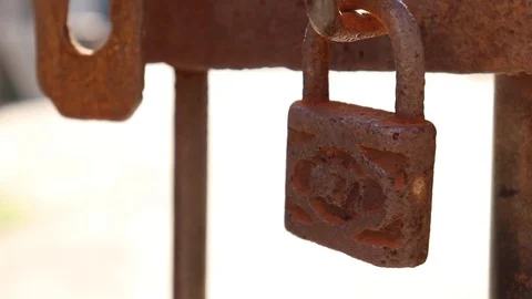 Extremely Old Rusty Lock swinging, 1080p 50fps Stock Footage 108142515