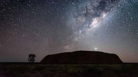 Extremely rare video of Milkyway rising over Uuru in Australia Stock Footage