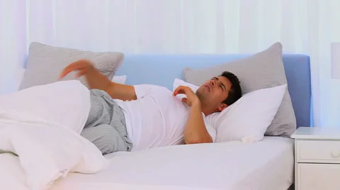 Extremly tired man sleeping fitfully Stock Footage
