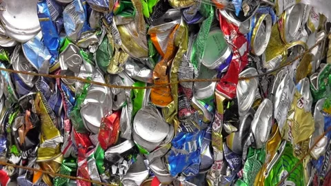 Extruded plastic waste and extruded aluminum cans Stock-Footage 103956603