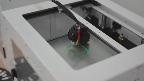Extruder head prints square shape in 3D printer chamber Stock Footage 335644045