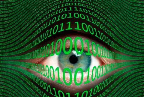 Eye and binary code Stock Photos