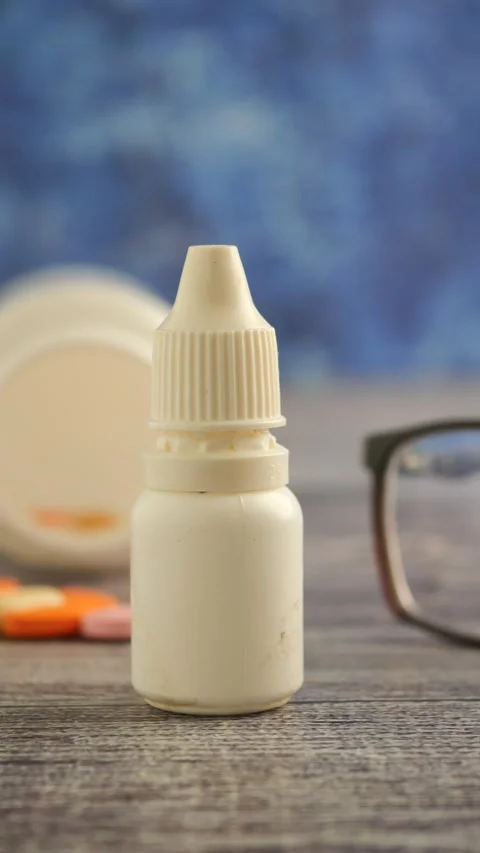 Eye care solutions with drops for better vision clarity Stock Footage 316358927