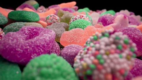 Eye-catching detailed macro gums candies, multicolored gelatin unhealthy sweets. Stock Footage 303354493