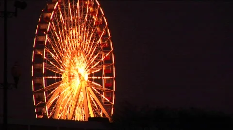 Eye-catching lighting on a ferris wheel Stock Footage