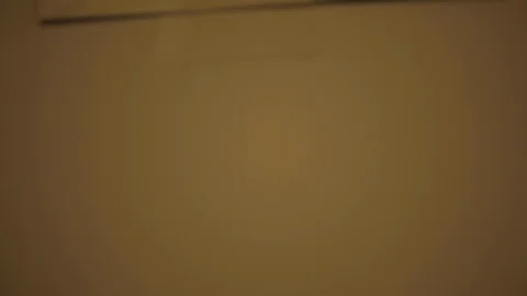 Eye Chart on a White Wall Stock Footage 112949862