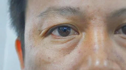 Eye close up of Asian man Stock Footage 58114176